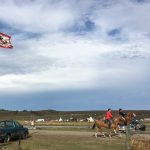 Horses and riders at Sacred Stone camp